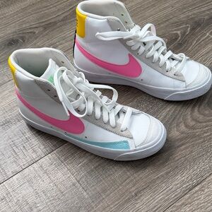 Nike Women’s White High-Top Sneakers with Pink Swoosh and Teal Accent